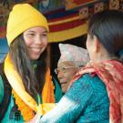 A UC Davis student at a New Year's ceremony at a monastery in Pokhara.