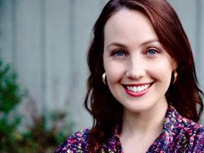 Kate Polakiewicz smiling at camera outdoors