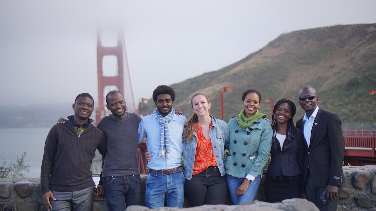 Students posing in front of the Golden Gate Bridge.