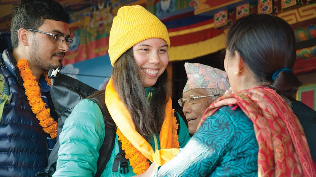 A UC Davis student at a New Year's ceremony at a monastery in Pokhara.