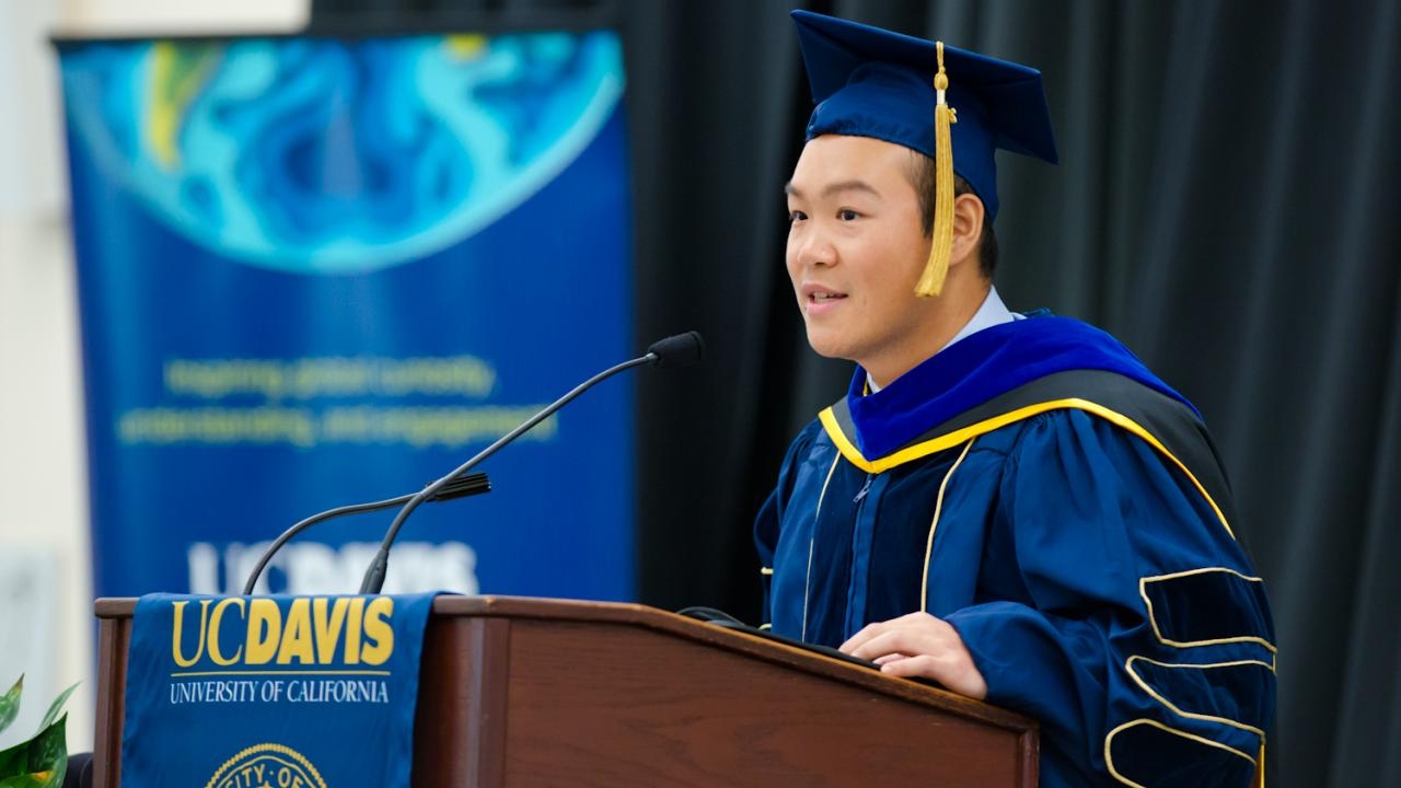 Zidong Li Ph.D. '18 speaking at International Graduation Celebration on June 14, 2018. TJ Ushing/UC Davis. Young man speaks at the International Graduation Celebration.