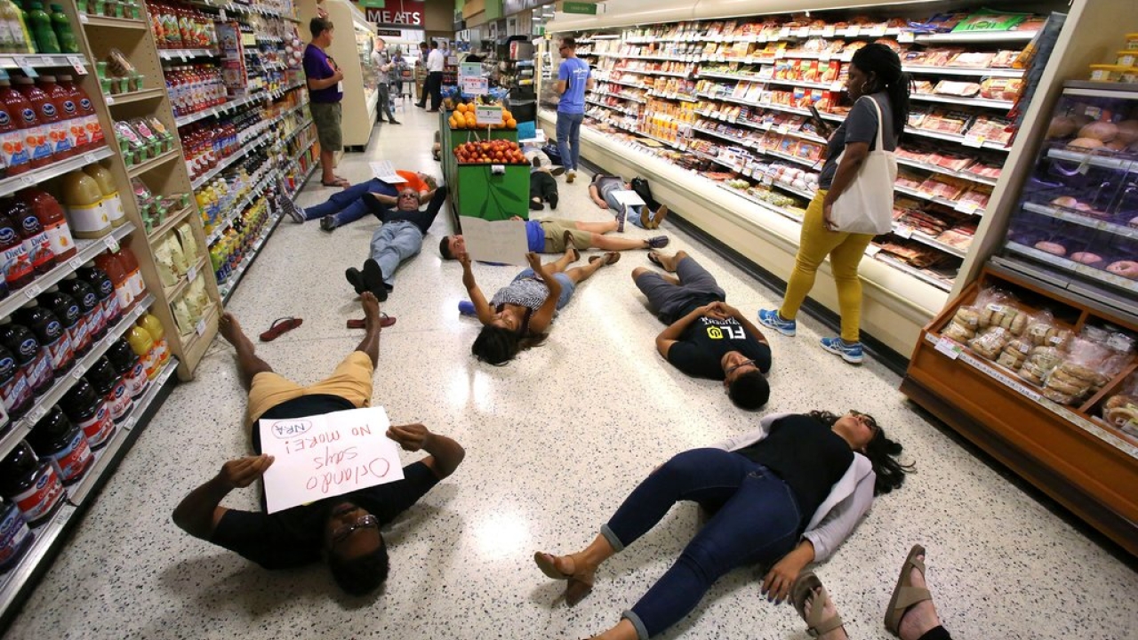 Demonstrators against gun violence lying on the floor of a supermarket in Orlando, Fla., last year.CreditCreditJoe Burbank/Orlando Sentinel, via Associated Press Demonstrators against gun violence lying on the floor of a supermarket in Orlando, Fla., last year.