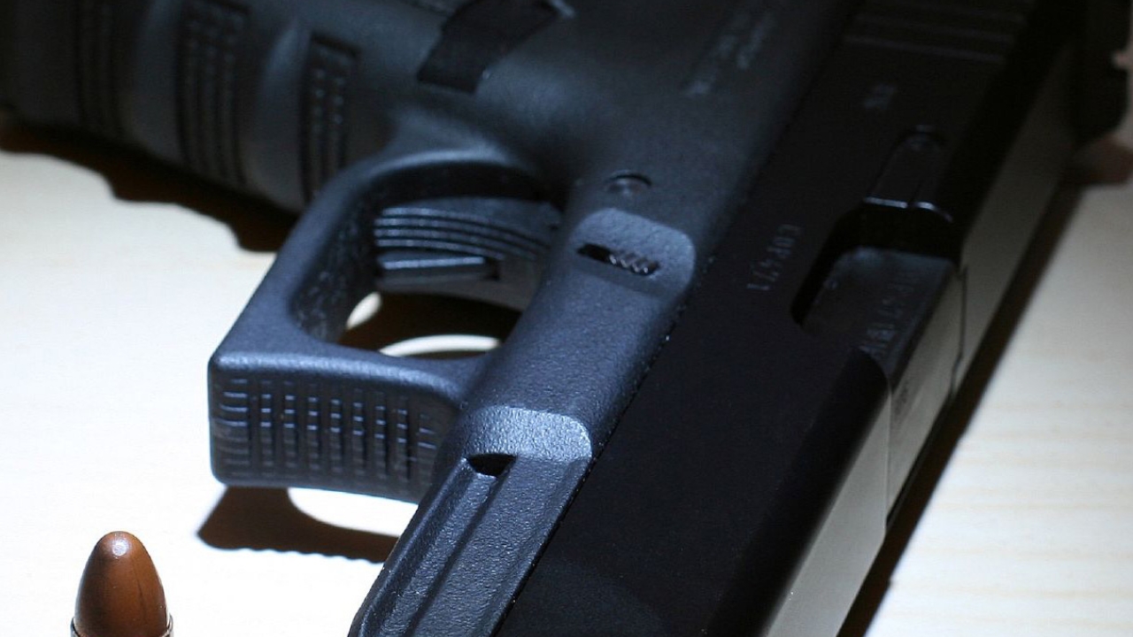 photo: flickr user Smarterlam Close up image of a handgun and bullet