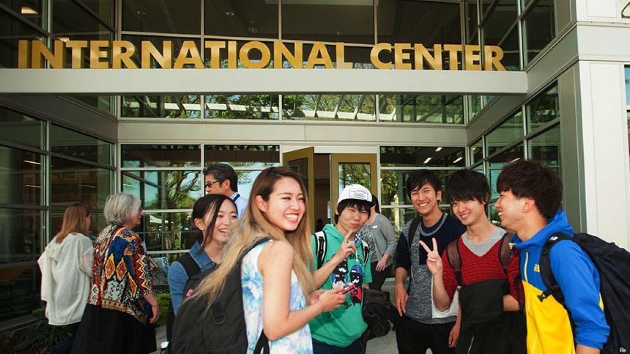 UC Davis students posing outside of the International Center