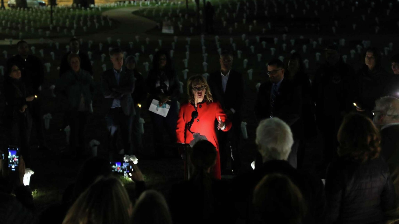 Amid 3,449 flower vases in Sue Bierman Park, former Rep. Gabby Giffords hosts a candlelight vigil to honor the lives lost to gun violence in San Francisco.