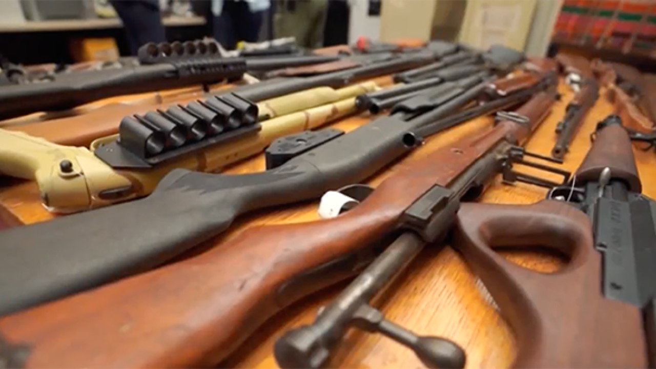 Guns lying acrosss table