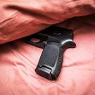 Gun under pillow