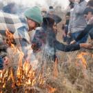 UC Davis students, academics and members of the local Native American community take part in a collaborative cultural burn at the Tending and Gathering Garden at the Cache Creek Nature Preserve in Woodland.