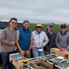 Vougioukas with lab members and the strawberry harvest-aid FRAIL-bot. (Stavros Vougioukas/UC Davis)