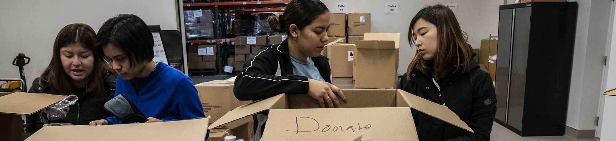 UC Davis students volunteering at a food bank